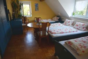 Postel nebo postele na pokoji v ubytování Gasthaus Zur Krone