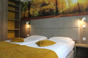 Postelja oz. postelje v sobi nastanitve Hotel Alpina + 32 fotografij