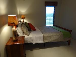 Ένα ή περισσότερα κρεβάτια σε δωμάτιο στο The Hub Vanuatu