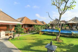 Swimming pool sa o malapit sa Lembongan Mantra Huts - CHSE Certified
