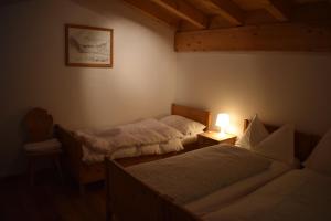 Voodi või voodid majutusasutuse Residence Miragolf toas