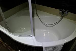 Vannituba majutusasutuses Wellness hotel Lucia