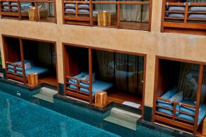 an overhead view of a building with windows and a pool at Avatar Railay in Railay Beach