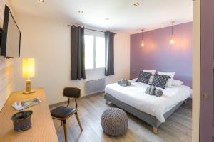 Ένα ή περισσότερα κρεβάτια σε δωμάτιο στο La Villa d'Emma +32 φωτογραφίες