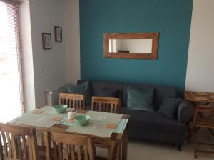 Χώρος καθιστικού στο Kropla Bałtyku Darłówko Apartament ECCO