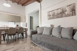 a living room with a couch and a table at Carlo Vivari House in Vivari