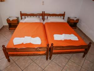 Postel nebo postele na pokoji v ubytování Hotel Olga