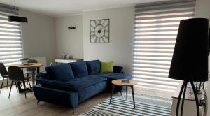 Posedenie v ubytovaní Apartamenty Leśna 1