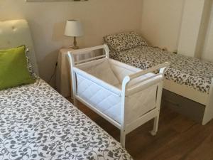 Postel nebo postele na pokoji v ubytování B&B CORTE SANT'ANGELO