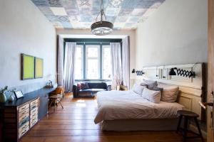 Ein Bett oder Betten in einem Zimmer der Unterkunft Linnen