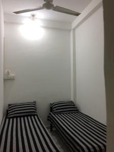Postel nebo postele na pokoji v ubytování RR House