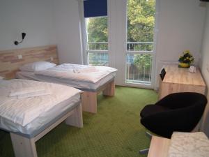 Ένα ή περισσότερα κρεβάτια σε δωμάτιο στο 5A Hotel Services