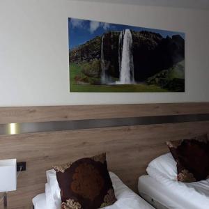 Voodi või voodid majutusasutuse Hotel Duus by Keflavik Airport toas