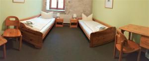 Postel nebo postele na pokoji v ubytování Hotel Gasthaus Weisser Mönch + 11 fotografií