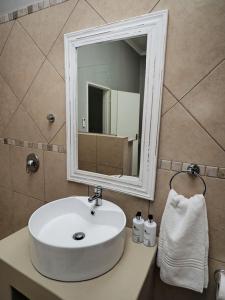 Et badeværelse på Poinsettia family Cottage