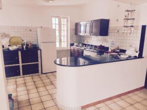 A kitchen or kitchenette at Villa GREG stupenda location sulla spiaggia con accesso diretto al mare