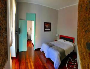 a bedroom with a large bed in a room at Hotel Rural Triana in Vallehermoso