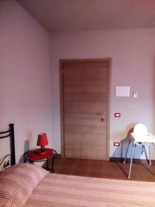 A bed or beds in a room at Rupe delle sorbe