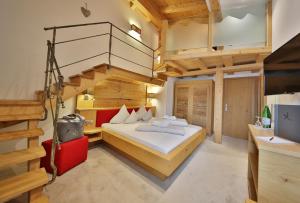 Postel nebo postele na pokoji v ubytování Hotel & Garni Das Köhle INKLUSIVE SUPER SOMMER CARD 2025
