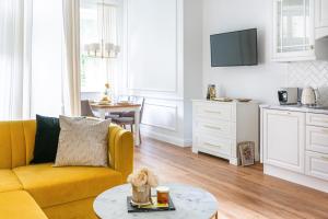 Telewizja i/lub zestaw kina domowego w obiekcie Apartament Golden Place