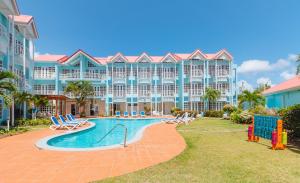 a resort with a swimming pool and a resort at Bay Gardens Marina Haven in Gros Islet