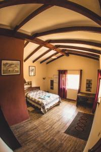 Tempat tidur dalam kamar di Hostel Serena