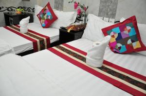 Postel nebo postele na pokoji v ubytování Pearl Premium Guest House(10/F) + 20 fotografií