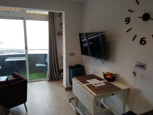 TV a/nebo společenská místnost v ubytování Best View Tenerife Vivienda Vacacional
