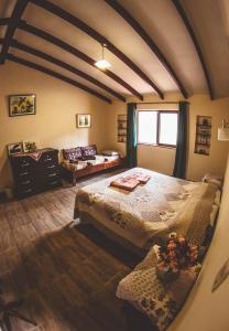 Łóżko lub łóżka w pokoju w obiekcie Hostel Serena
