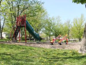a playground with a slide in a park at Round Top Two-Bedroom Cottage 8 in Gettysburg