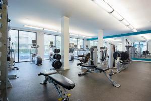 a gym with treadmills and cardio equipment in a building at Sonder at La Villita in San Antonio