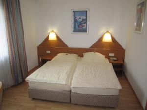 Postel nebo postele na pokoji v ubytování Hotel Fährhaus