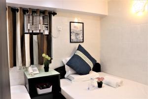 Ένα ή περισσότερα κρεβάτια σε δωμάτιο στο The One Inn