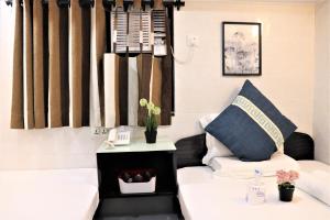 Ένα ή περισσότερα κρεβάτια σε δωμάτιο στο The One Inn