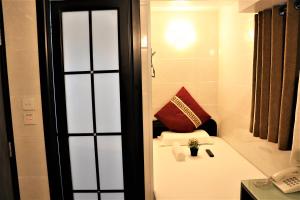 Ένα ή περισσότερα κρεβάτια σε δωμάτιο στο The One Inn
