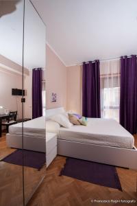 Кровать или кровати в номере B&B St. Peter's Suites