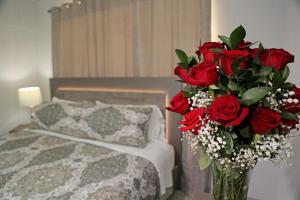 Itza-Bella Suites 객실 침대