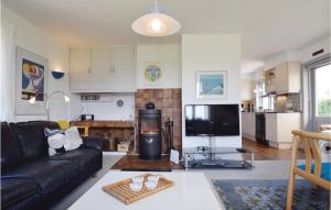 TV a/nebo společenská místnost v ubytování Two-Bedroom Holiday Home In Bagenkop