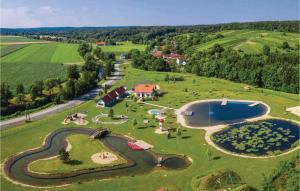 an aerial view of a park with a pond at Ferienhaus-gaas in Gaas