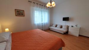 Postel nebo postele na pokoji v ubytování Residenza Chiara