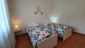 Postel nebo postele na pokoji v ubytování Residenza Chiara