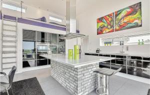 Kuchyň nebo kuchyňský kout v ubytování Holiday Home Oddermosen Sydals Xi