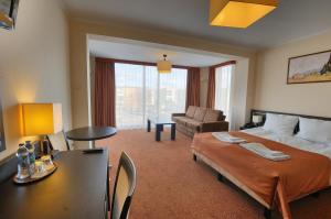 Postel nebo postele na pokoji v ubytování Hotel Martex