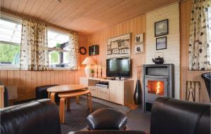 TV a/nebo společenská místnost v ubytování Holiday Home Uglevej Ebeltoft Iii