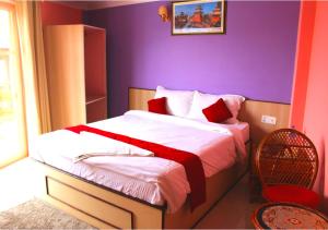 Postel nebo postele na pokoji v ubytování Hotel Tranquil