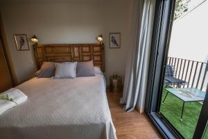 Posteľ alebo postele v izbe v ubytovaní Mi Villa Arévalo