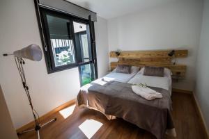 Posteľ alebo postele v izbe v ubytovaní Mi Villa Arévalo
