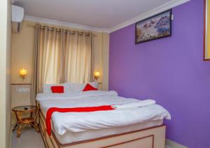 Postel nebo postele na pokoji v ubytování Hotel Tranquil