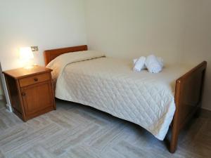Casa per Ferie Ulivo d'Assisi客房内的一张或多张床位