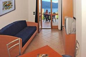 אזור ישיבה ב-Residence Borgo Dei Limoni - Appartamenti con Garage